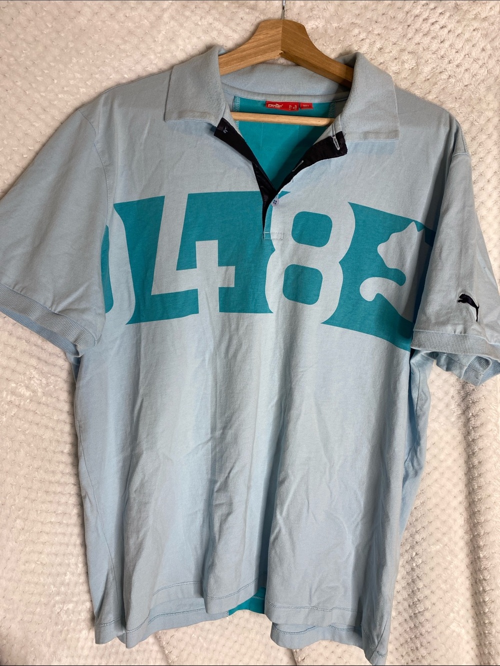PUMA Men’s Light Blue Polo Shirt with Teal Graphic